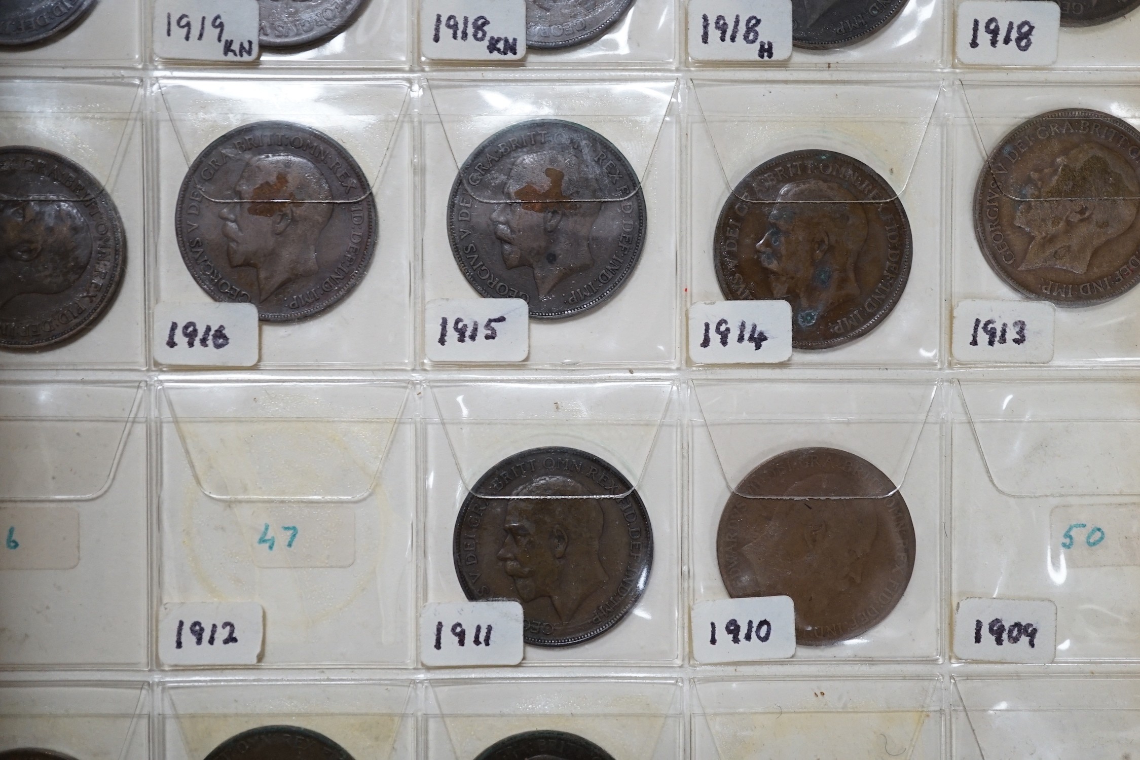 UK and World coins in a case and three albums